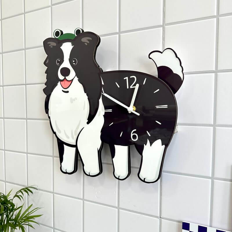Border Collie dog-shaped wall clock mounted on white tiled wall