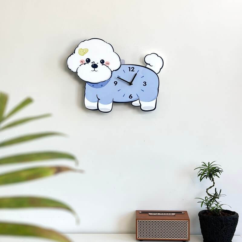 Bichon Frise Saturn hairpin clock on white wall with green plant and home decor items