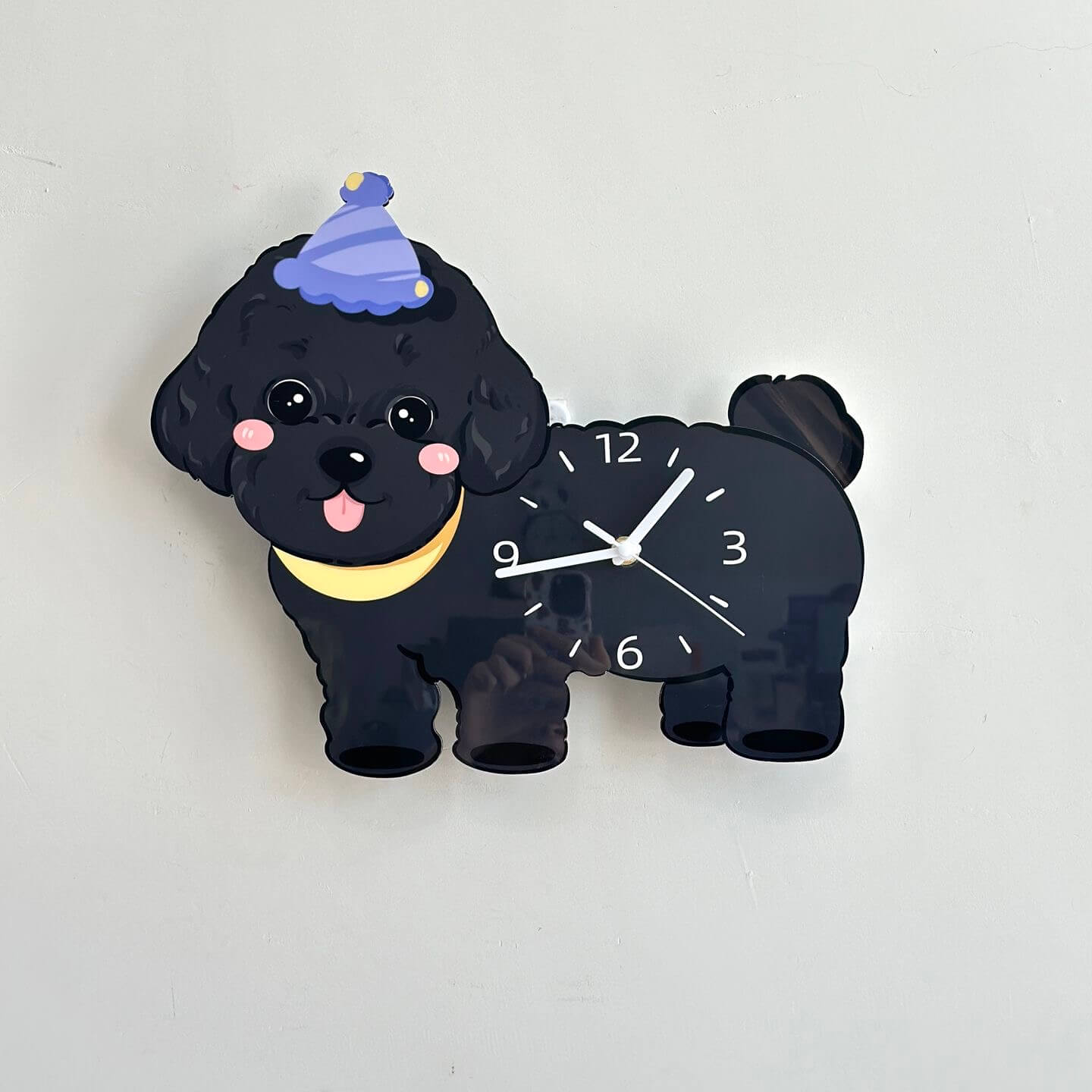 Black poodle pet clock frontal view on a clean cream wall - stylish dog wall art