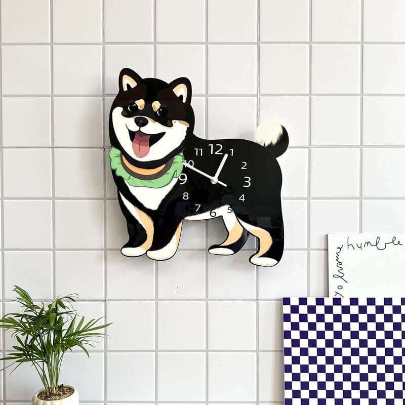 Black Shiba Inu dog clock angled view on white tile wall with green plant and checkered cloth