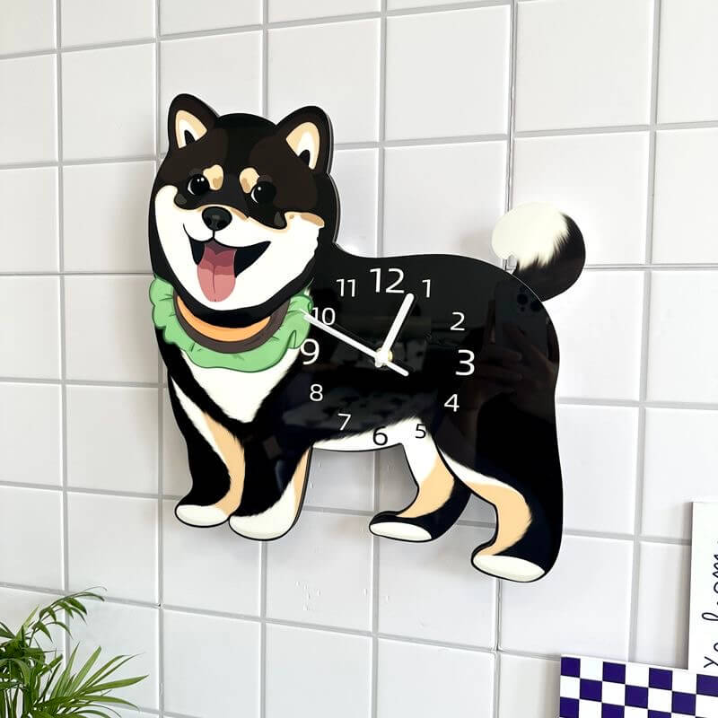Black Shiba Inu dog-shaped wall clock mounted on white tile wall with green plant decor