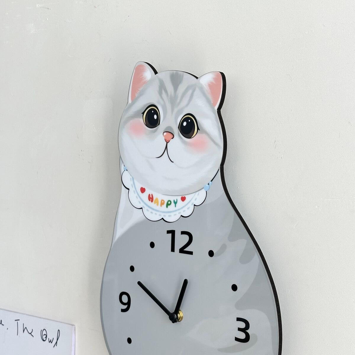 British Shorthair silver shaded clock close-up showing adorable face and pink ears