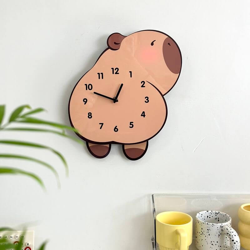Capybara lying clock close-up showing adorable face and pink blush