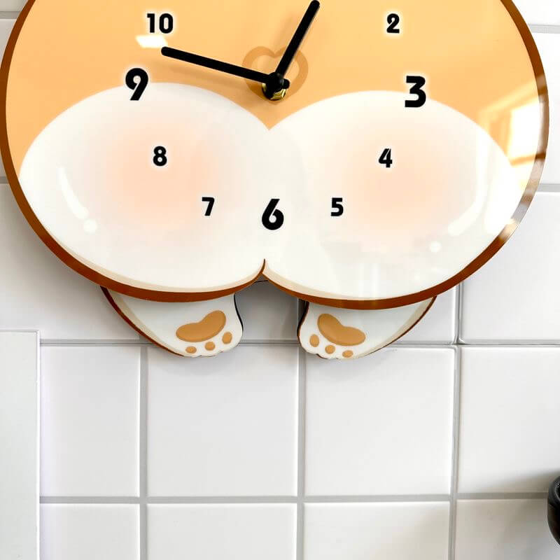 Corgi butt clock close-up showing adorable peachy bottom detail