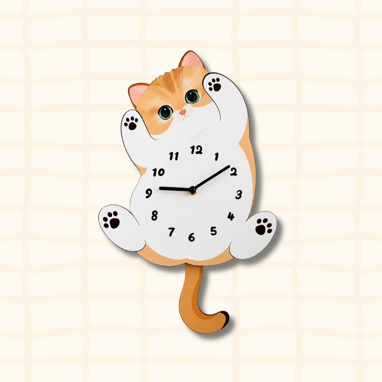 Cute orange tabby cat-shaped wall clock lying on back with paws up, green eyes and pink nose, cartoon acrylic design