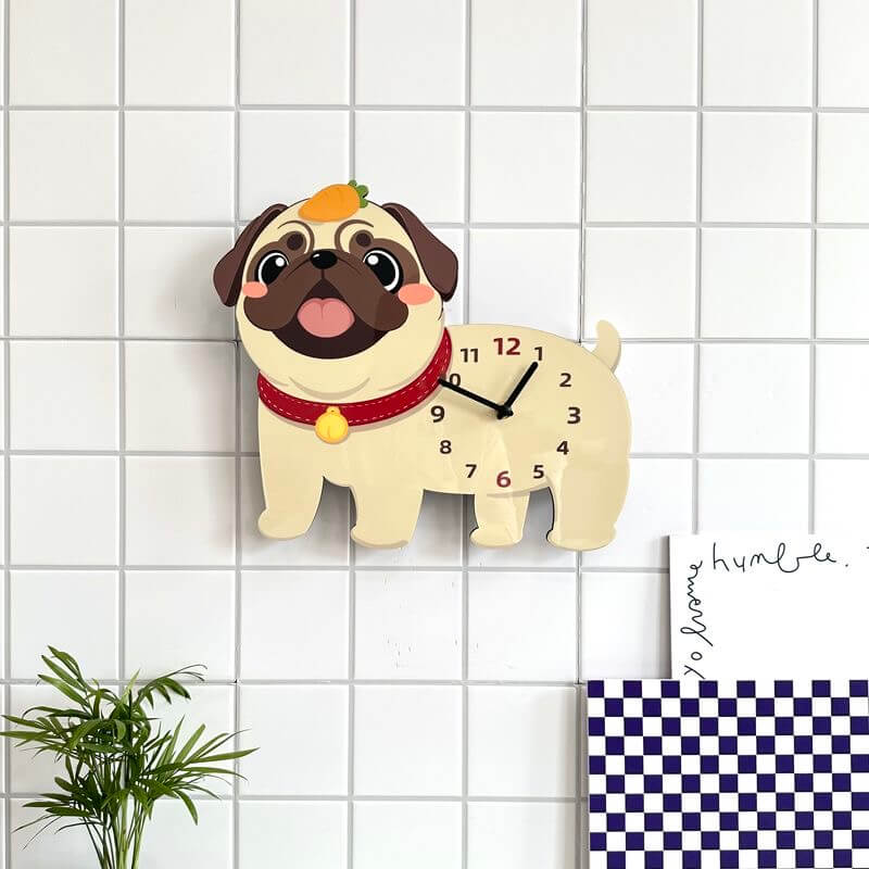 Pug carrot hat clock on white wall with green plant and home decor items