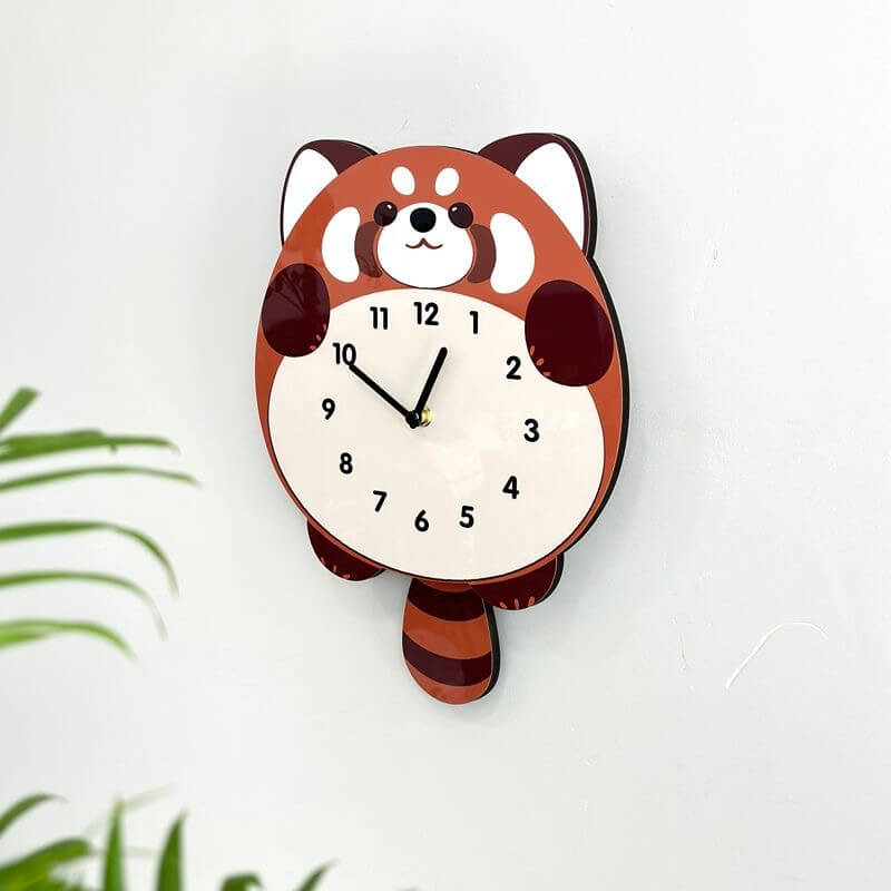 Red panda pet clock on white wall with green plant leaves - cute exotic wall art