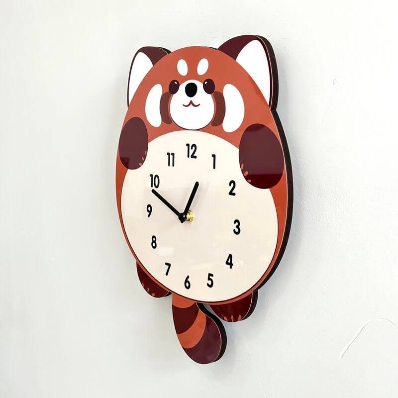 Close-up of red panda clock on tile wall showing fluffy tail and numbered clock face