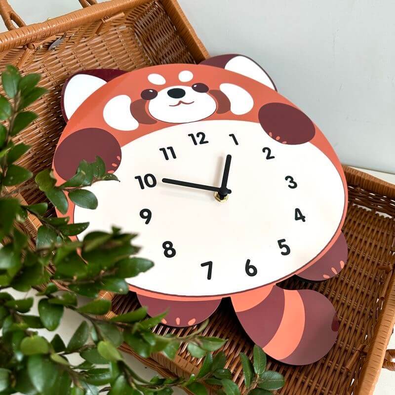 Red panda pet clock on white tile wall with festive decoration